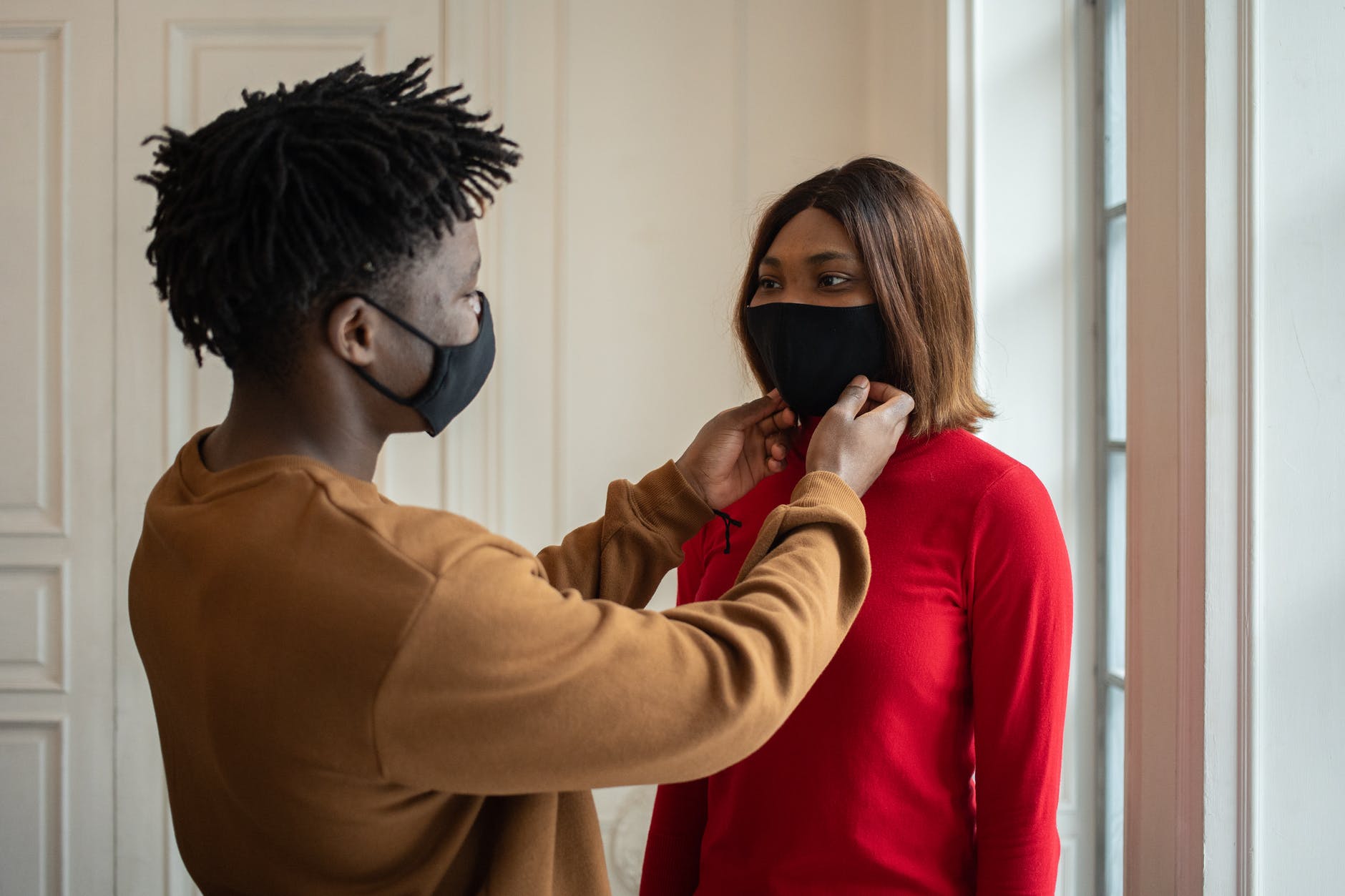 black couple in protective masks