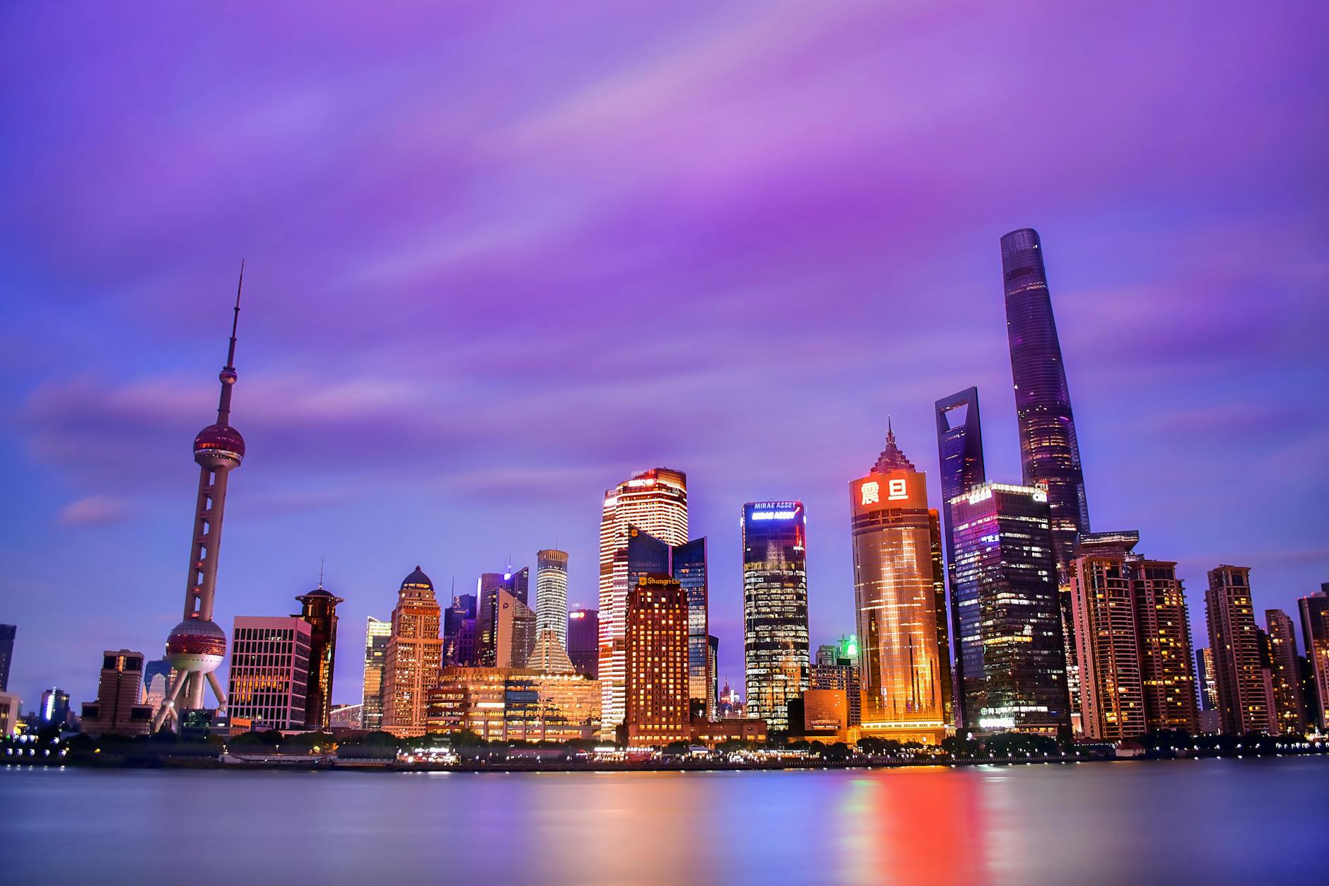 illuminated buildings at dusk